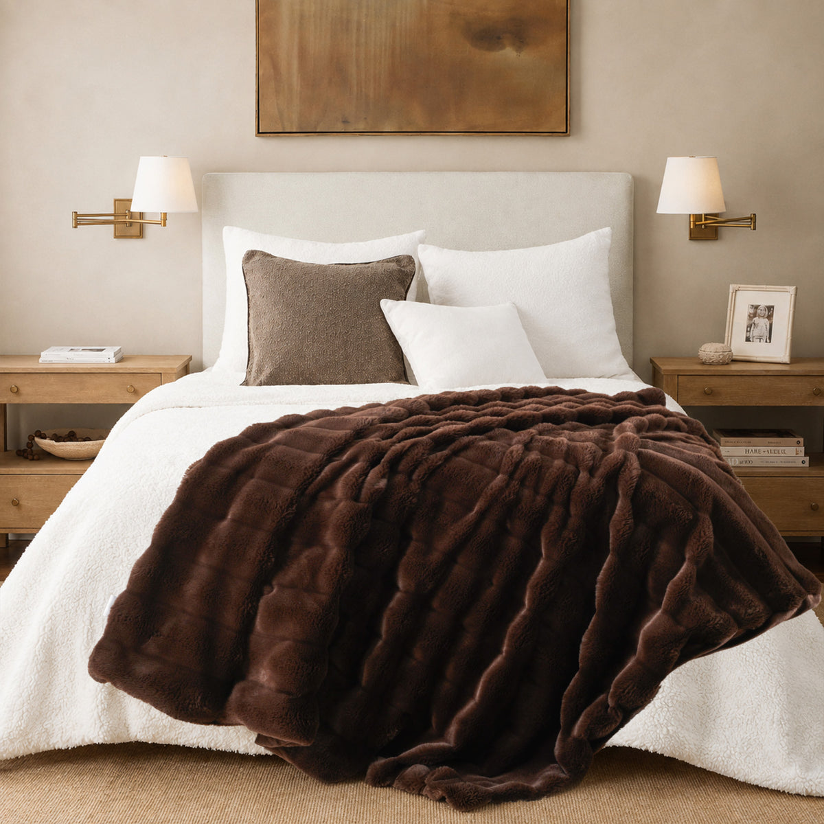 Chocolate Striped Plush Blanket draped across a white bedroom bed